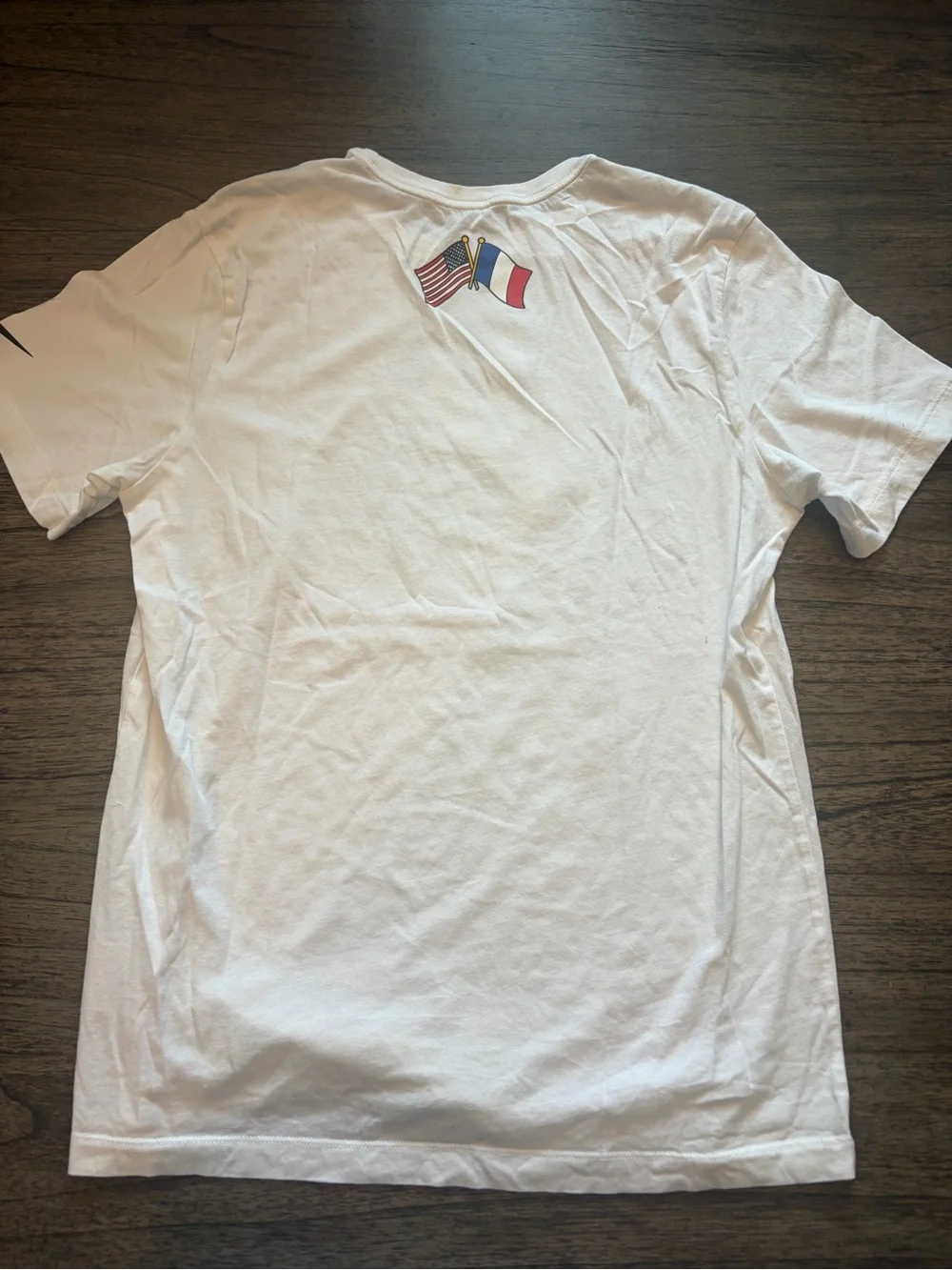 Nike White Men’s Graphic Short-Sleeve Shirt with Pink Eagle Accent
